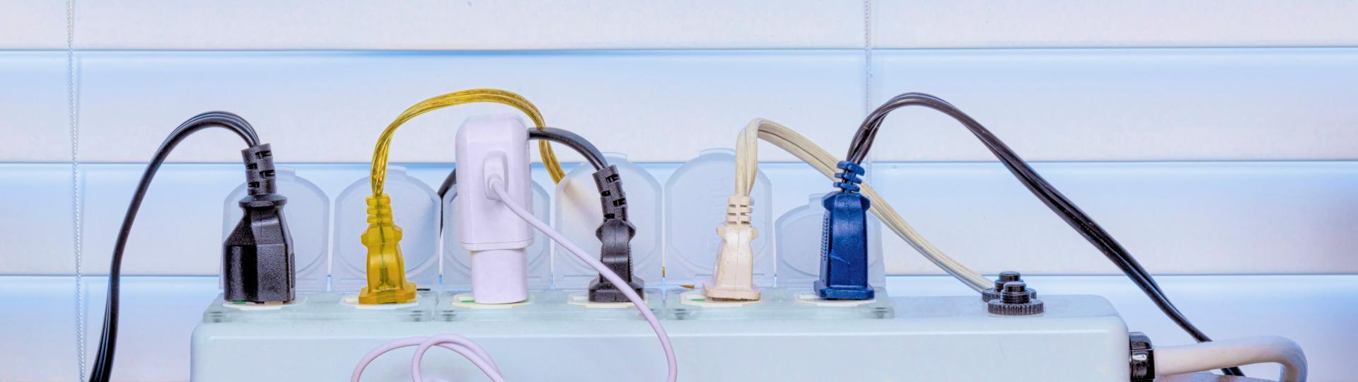 electrical cords plugged into an extension strip